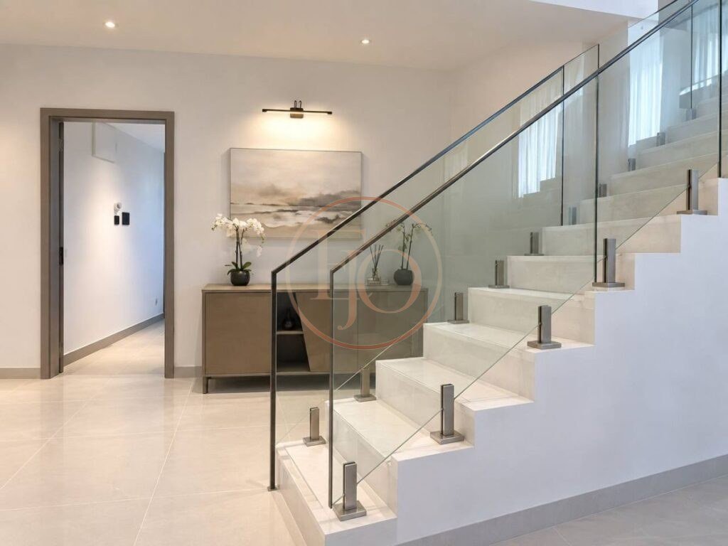 Glass staircase in 4 bedroom Old Ikoyi maisonette